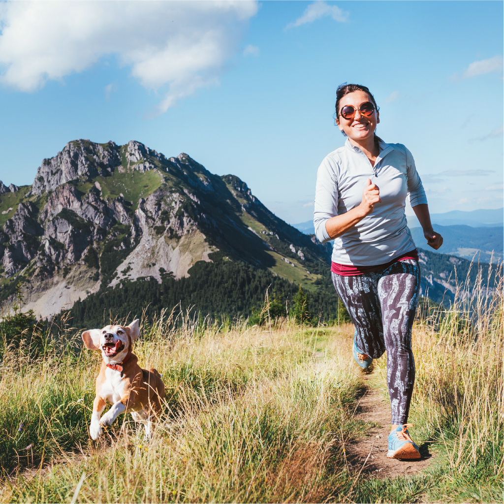 Lady and Dog Running Outside